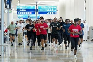 Dubai Airports transforms wait time into wellbeing with community walks at DXB