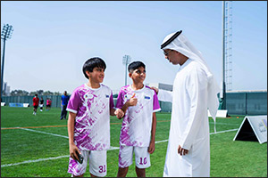 H.E. Dr. Ahmad Belhoul Al Falasi attends UAE School Games Football and praises high level of competition among participating students