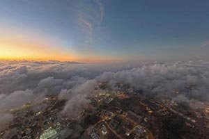 Sunset in Aseer: A Breathtaking Tableau of Clouds and Mountain Peaks